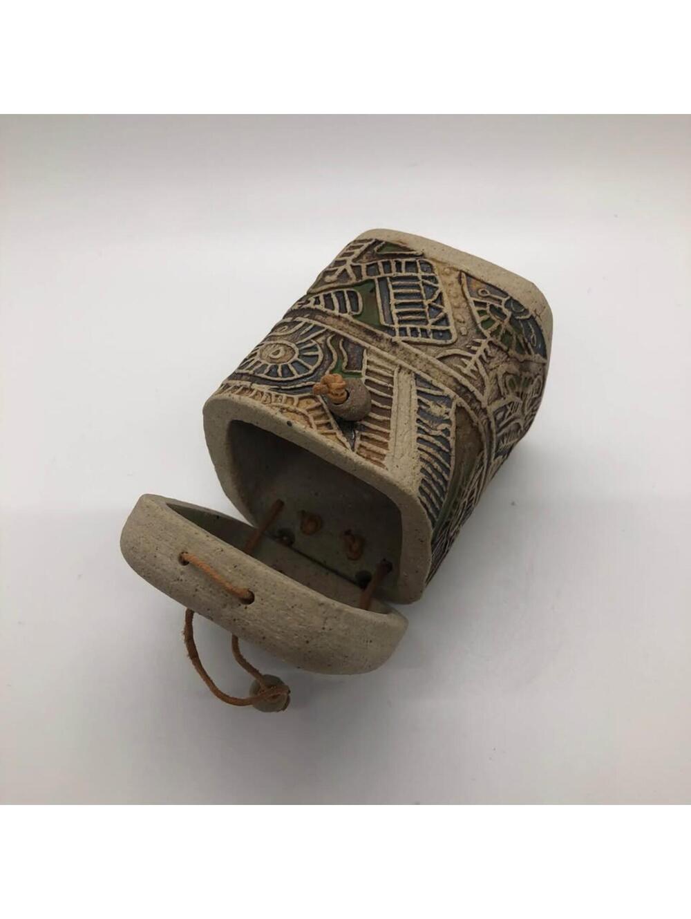 Tawadi Art Pottery trinket box with a leather hinge and Venezuelan stamp designs